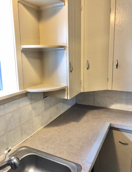 Kitchen with built in corner storage and charm! - 601 J Street