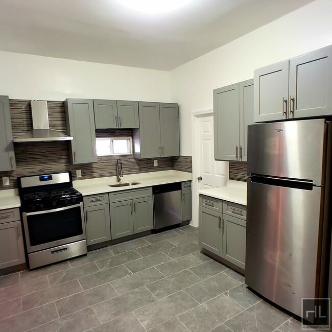 Building Photo - Floor through 3 Bedroom with backyard on W...