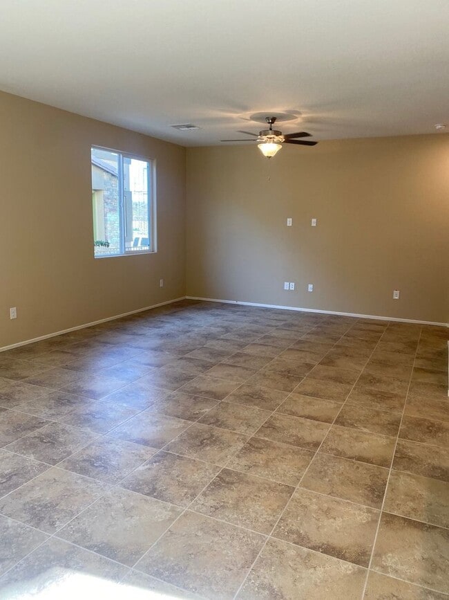 Building Photo - Spacious Townhouse with Loft & Rare 3-Car Garage!