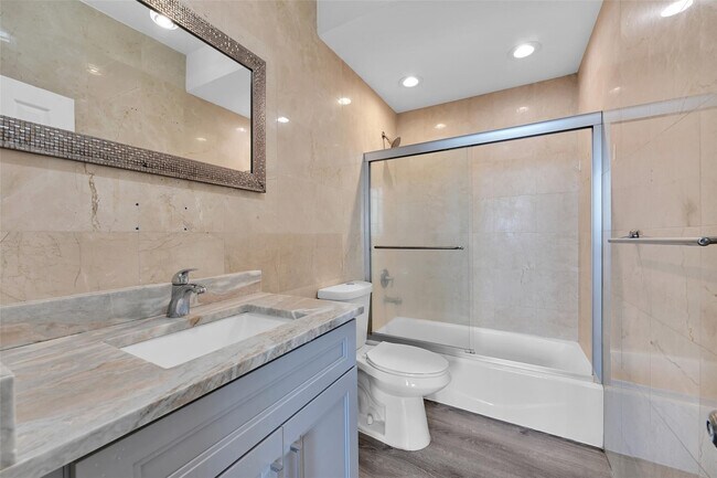 Building Photo - 5005 Collins Ave