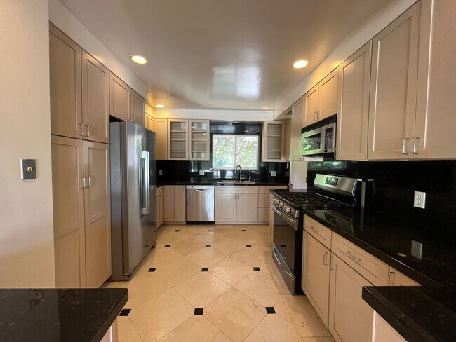 Building Photo - A hidden gem with tree-top view. Tranquil and private. Light and airy