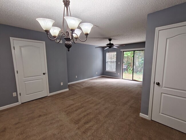 Building Photo - Spacious 2-Bed, 2.5-Bath Townhome with Gar...