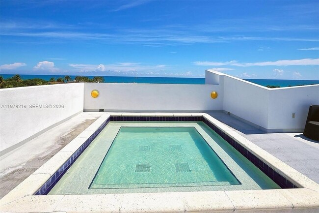 Building Photo - 7700 Collins Ave