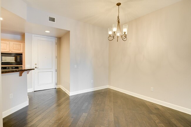 Building Photo - Luxury Guard-Gated 2-Bedroom Condo with Private Garage & Resort Amenities!