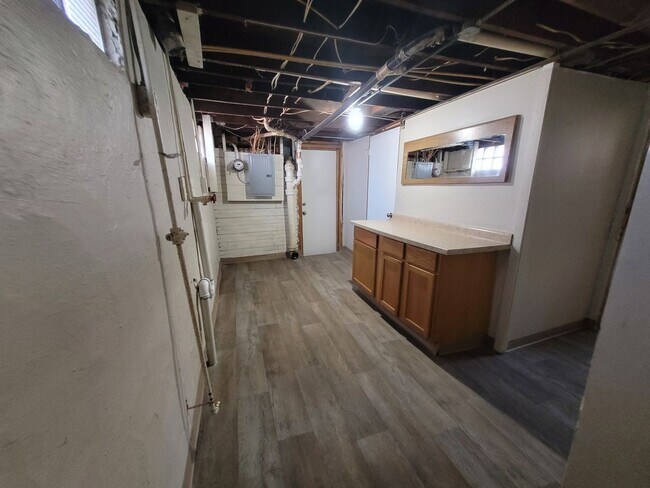 Building Photo - Four bedroom home on Indianola Ave with large yard and two decks!