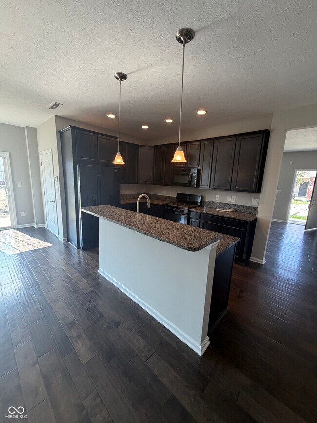 Building Photo - 9681 Angelica Dr