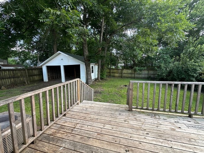 Building Photo - Welcome to this stunning 4-bedroom, 2-bath...
