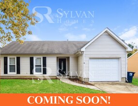 Building Photo - This home exudes a cheerful and welcoming ...