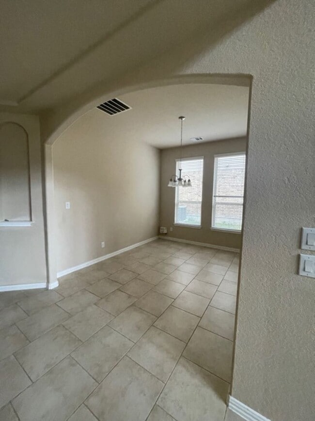 Building Photo - Move-In Ready! Stunning 1.5-Story Home wit...
