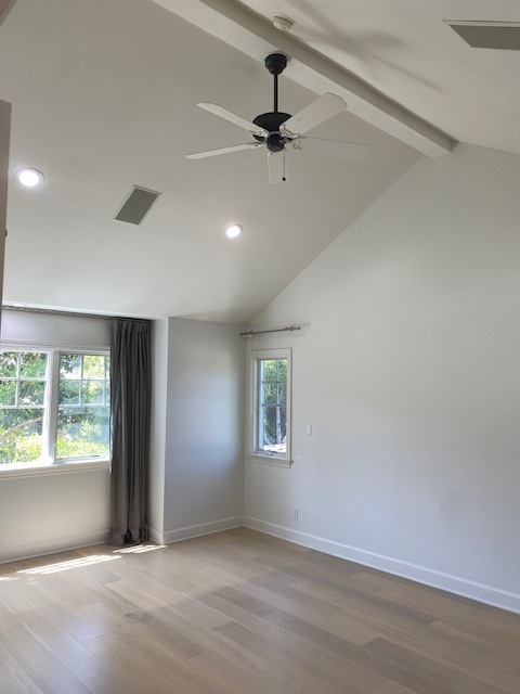 Primary Suite with Vaulted Ceilings and Fireplace - 653 36th St