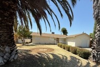 Building Photo - Updated Property with Large Front & Backyard