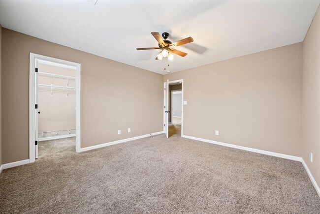 Building Photo - Four Bedroom with Three Car Garage!