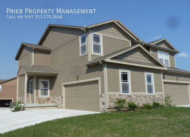 Building Photo - Persimmon Pointe Duplex - Available Septem...