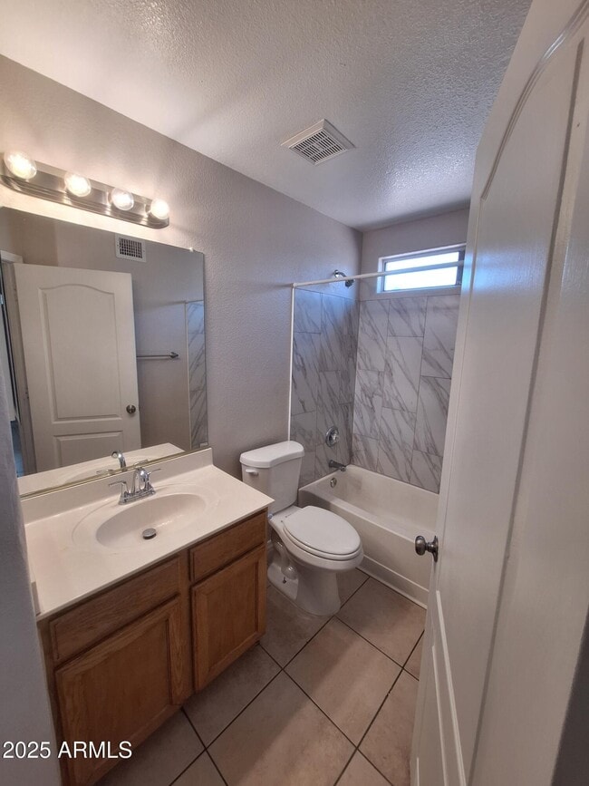 Building Photo - 9345 E Onza Ave
