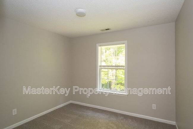 Building Photo - 7916 Strawberry Meadows St