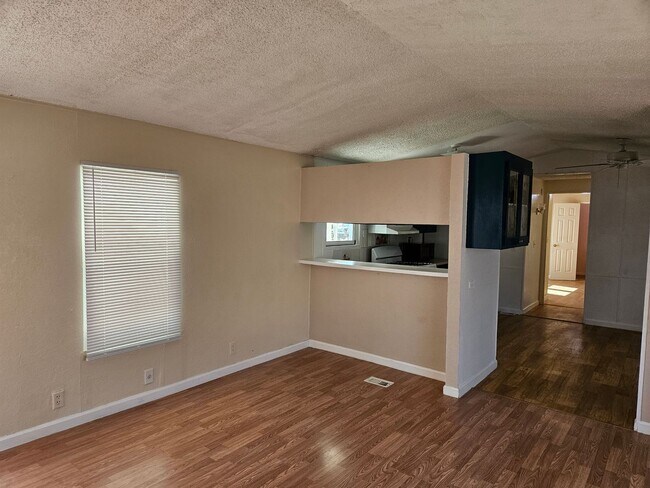 Building Photo - First Month Free!! Remodeled and Cute Manufactured Home in Central BHC