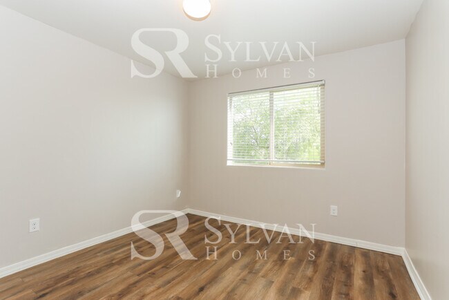 Building Photo - The living is easy in this 5 bedroom, 3 ba...