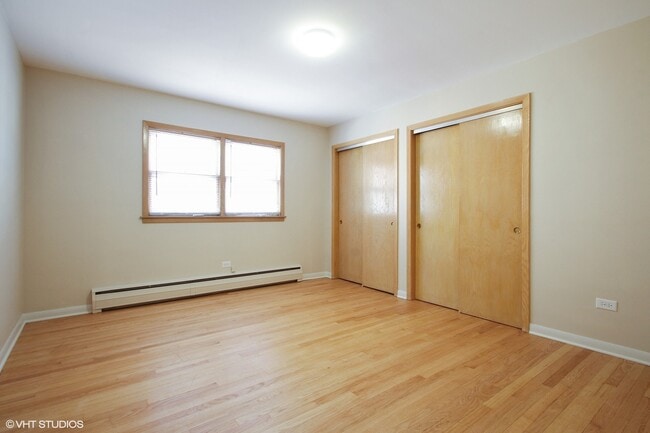 Building Photo - 8317 W Summerdale Ave