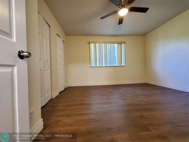 Building Photo - 7661 Tamarac Island Cir