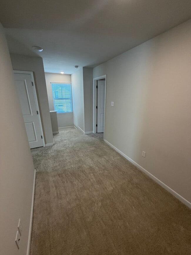 Building Photo - Modern Two-Story Townhome with Open Floor Plan and Garage