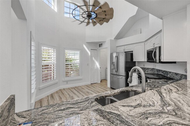 Building Photo - Stunning Custom Rental in Gated 55+ Royal ...
