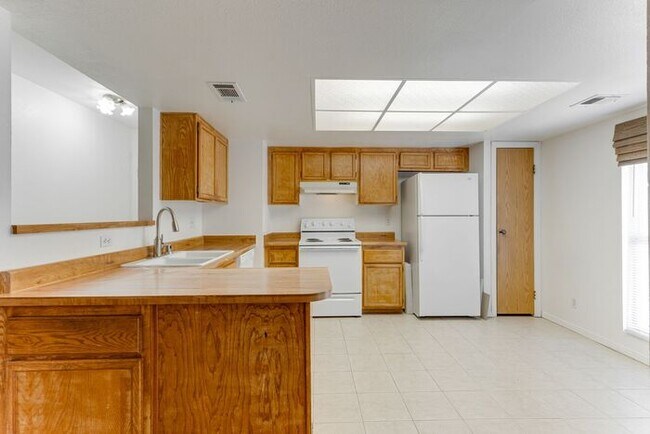 Building Photo - Charming 2 Bed, 2 Bath Condo with Fireplace & Balcony! 89011
