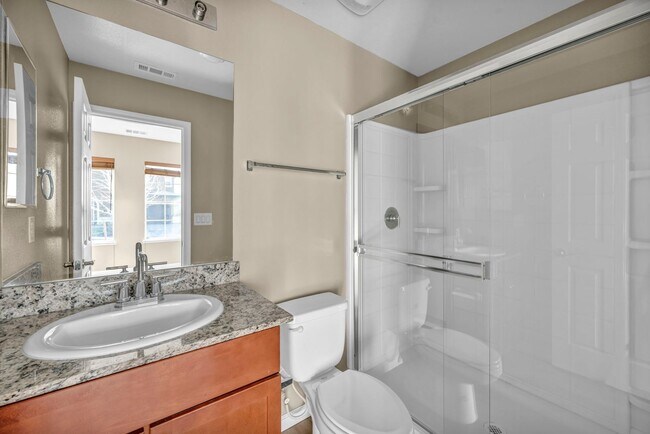 Building Photo - Sun-Filled, Spacious Living with a Three-Car Garage