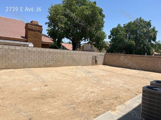 Building Photo - 2739 E Ave J6