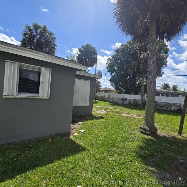 Building Photo - 3860 NW 8th Pl