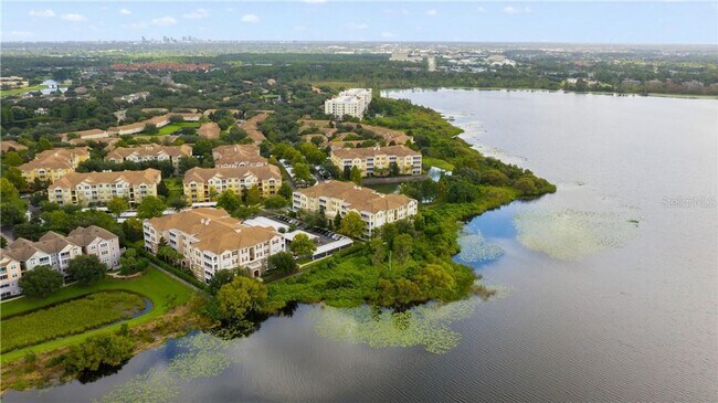 Building Photo - Beautiful WATERFRONT 3 bedrooms Condo located in MetroWest with ELEVATOR! Rare find!