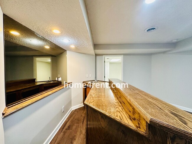 Building Photo - Elegant Cul-de-Sac Retreat with 5th Bedroo...