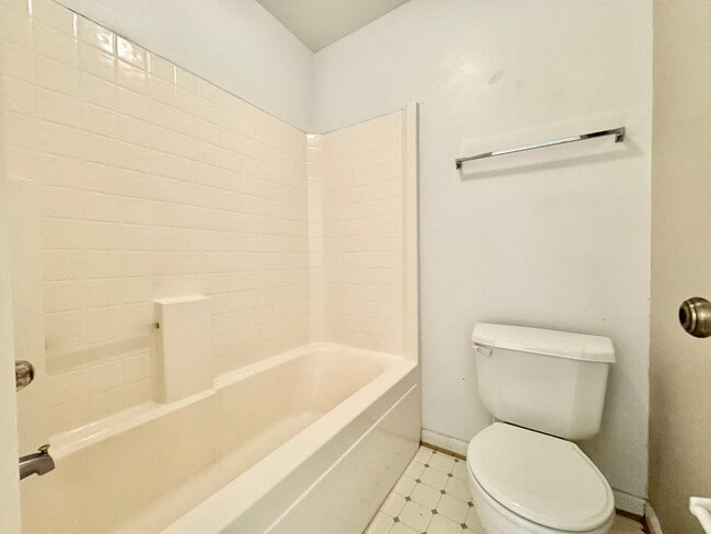 Building Photo - Available 06-15-25! End-Unit Condo w/2 Pri...
