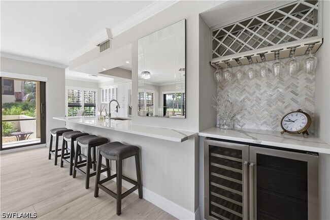 Building Photo - 6080 Pelican Bay Blvd