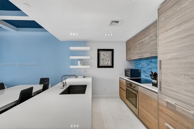 Building Photo - 1300 S Miami Ave