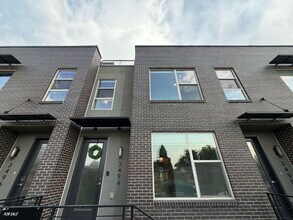Building Photo - ~Available Now~ Modern 2-Bed Townhouse with Scenic Views near City Park - built in EV charger!