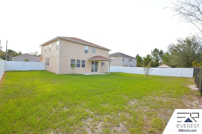 Building Photo - SPACIOUS, FULLY FENCED 4/2.5/2 IN DESIRABLE MATANZAS WOODS