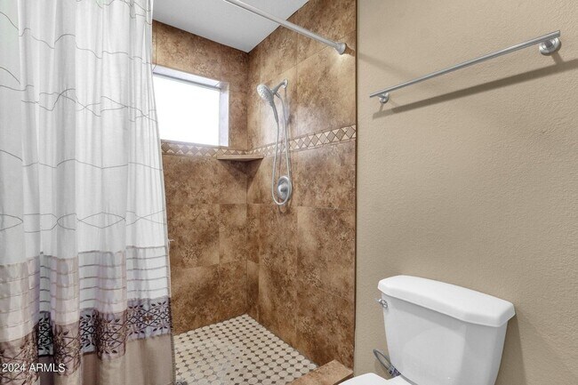 Building Photo - Welcome to this stunning 3-bedroom, 2-bath condo in the heart of McCormick Ranch!