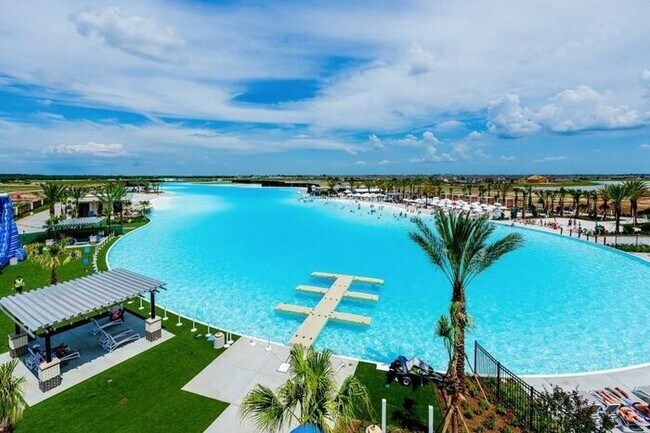 Building Photo - Your Next Home in Sunterra – Amenities You’ll Love