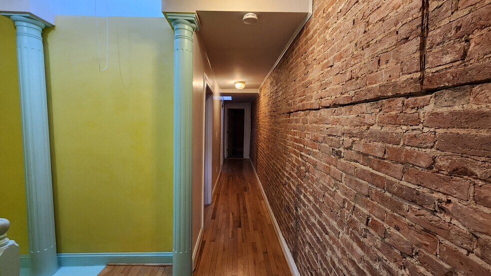 Hallway Upstairs - Original Brick - 2539 N Howard St
