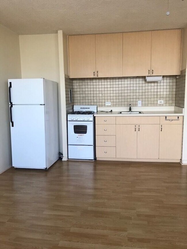 Building Photo - Available Now | Full Size Studio with 1 Ba...