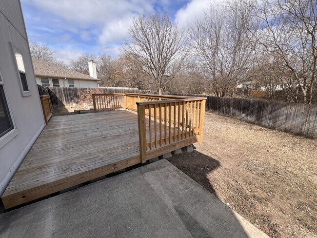 Building Photo - Generous Outdoor Space & Lawn Care Included!