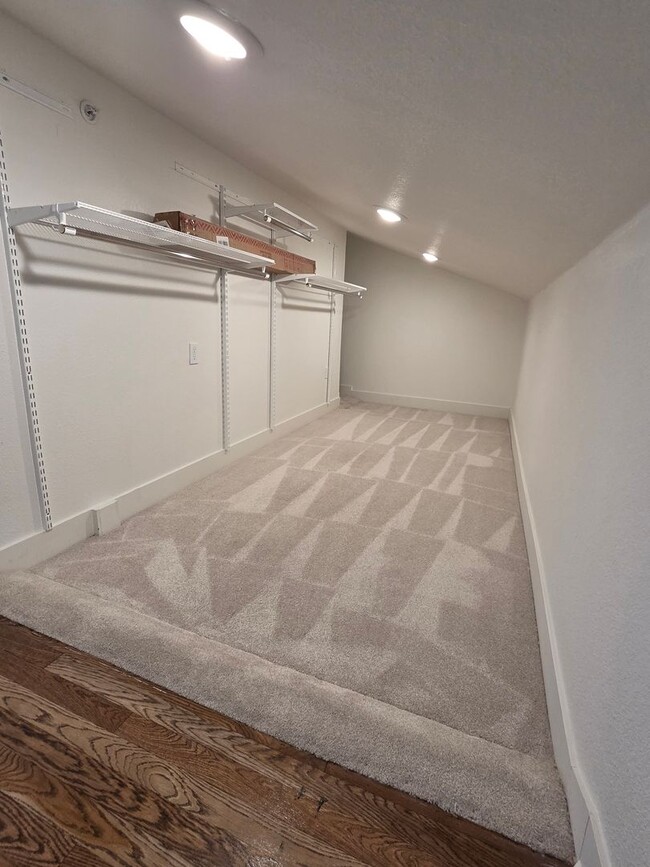 Building Photo - STUNNING 4-LEVEL TOWNHOME IN HIGHLANDS WITH SAUNA, 2-CAR GARAGE + AMAZING ROOFTOP DECK!