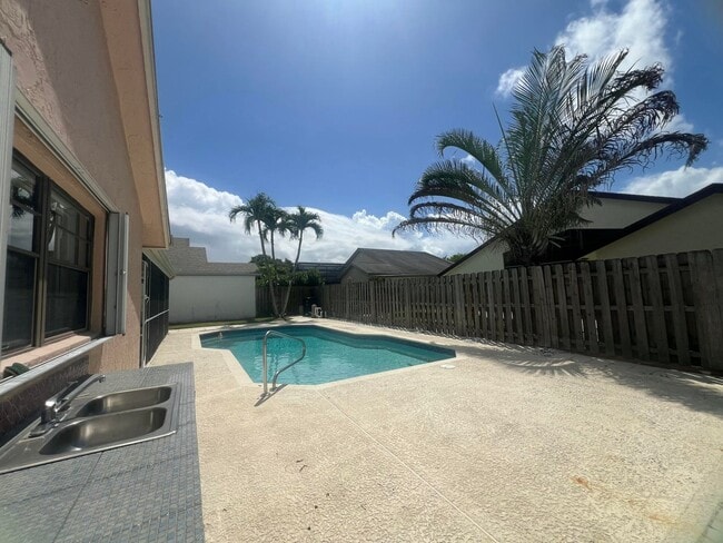 Building Photo - Rustlewood Avenue, Boca Raton, FL 33428 - 4 BR 2 BA single-family home
