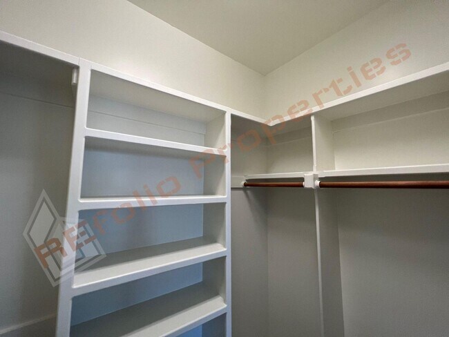 Building Photo - Elegant 3 Story 3 Bedroom Formal Model Tow...