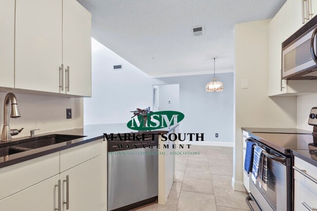 Building Photo - STUNNING GATED COMMUNITY CONDO ON WHITEMAR...