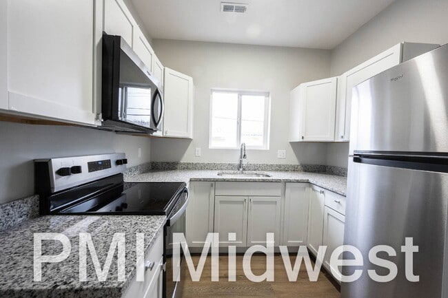 Building Photo - "Charming 2-Bedroom Gem with 1.5 Baths on East Michigan Street – A Cozy 949 Sq. Ft. Haven in Indi...