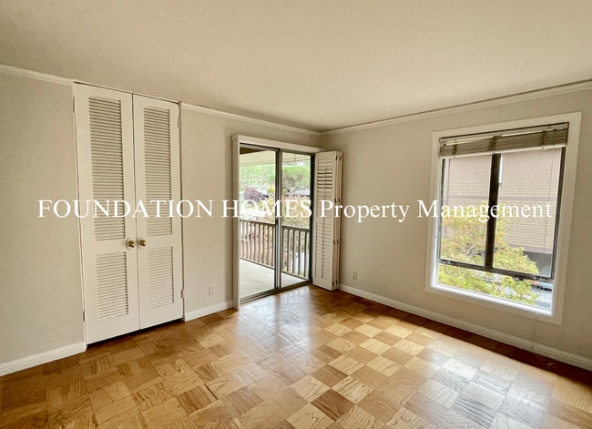 Building Photo - Bright & Tranquil End Unit!  A/C! Parking! Community Pool! FOUNDATION