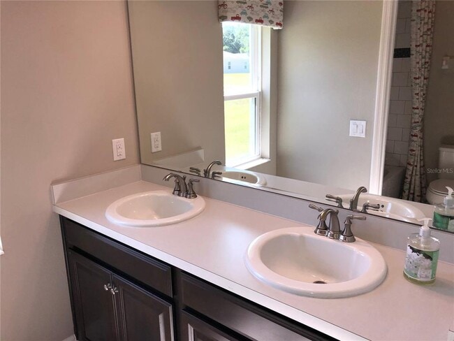 Building Photo - 5512 Windsong Oak Dr