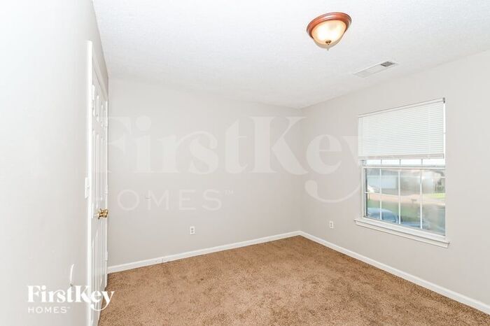 Building Photo - 7678 Breeze Wood Cove