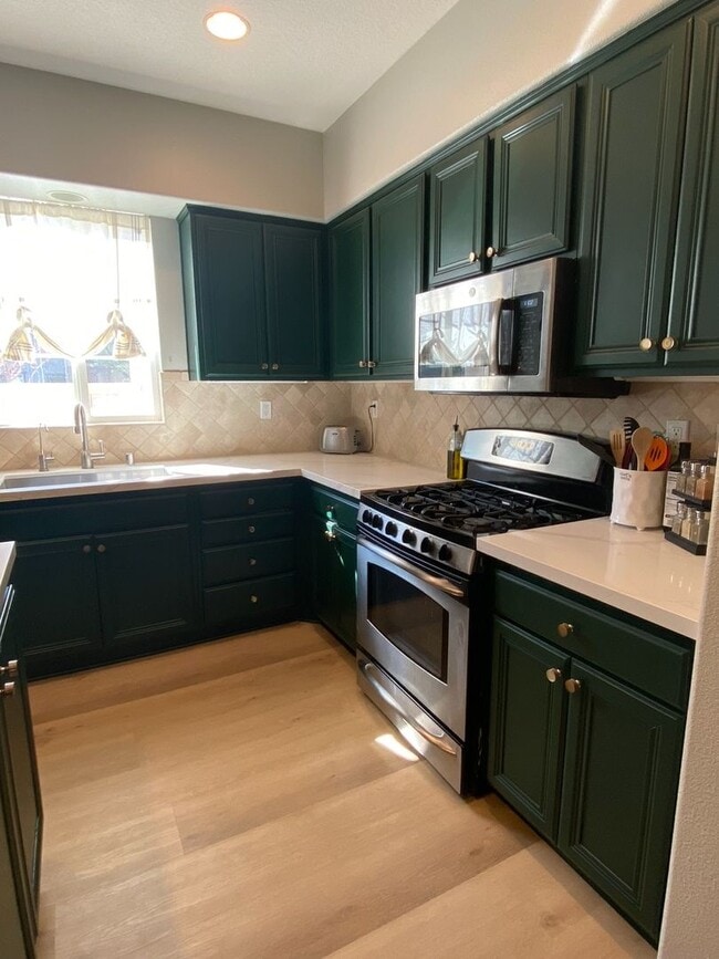 Building Photo - COMING SOON! Spacious 4-Bedroom Townhome w...